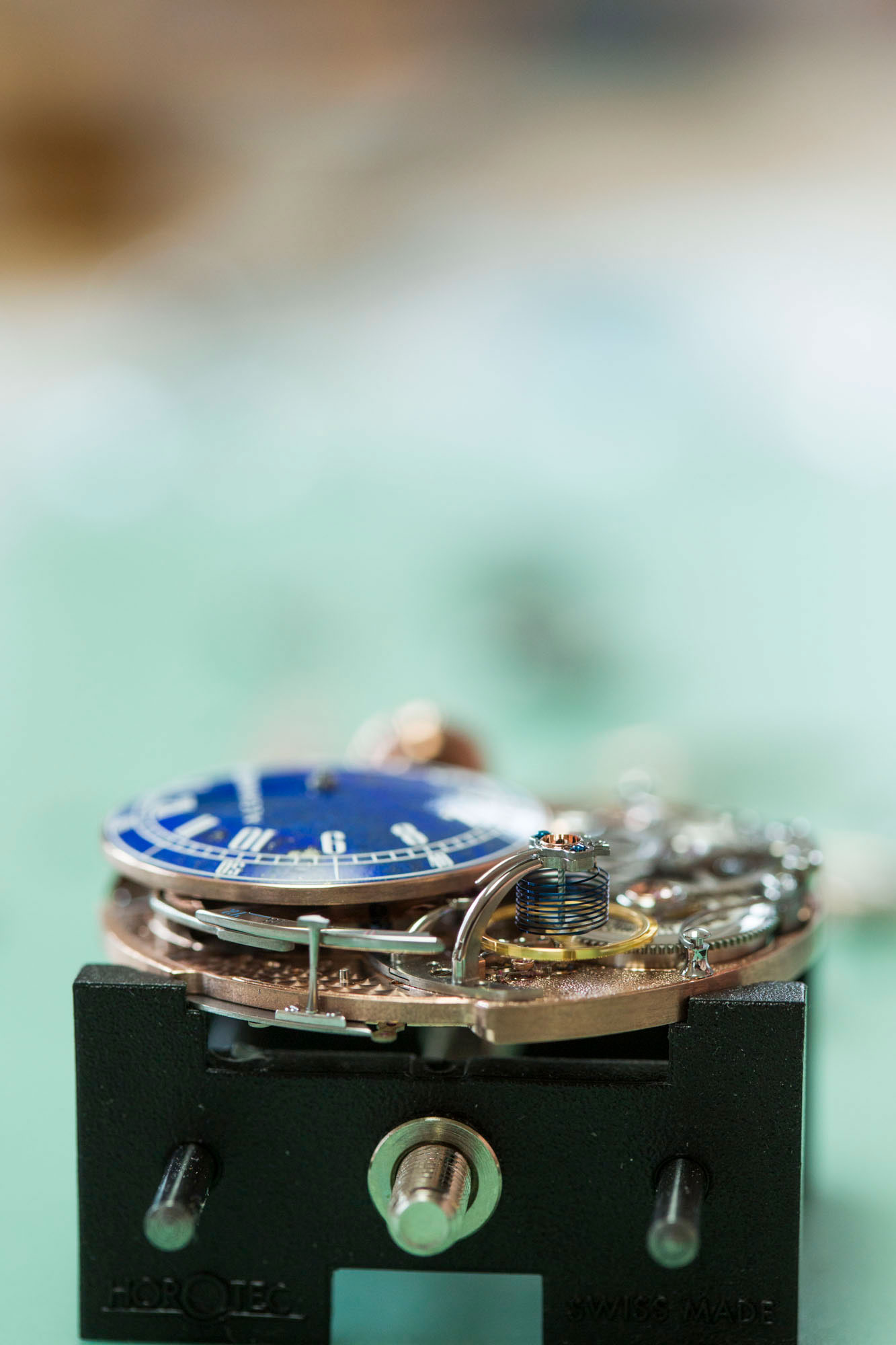 Closeup view of the side of the Cu29's movement, focusing on the variable inertia balance